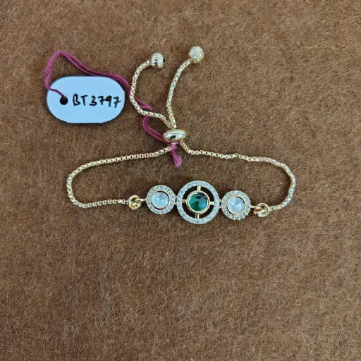 Red kundan stone bracelet with teardrop crystals, elegant traditional wedding jewelry