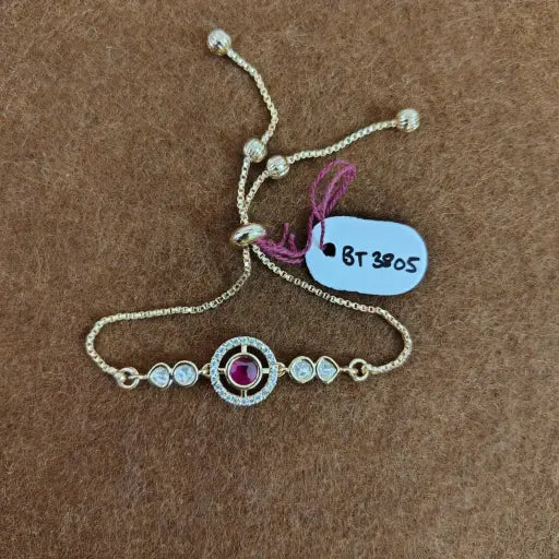 Ruby pink center kundan bracelet with halo design, statement bridal accessory