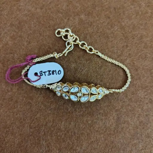 Antique finish clustered dome bracelet, handcrafted gold-toned ethnic accessory