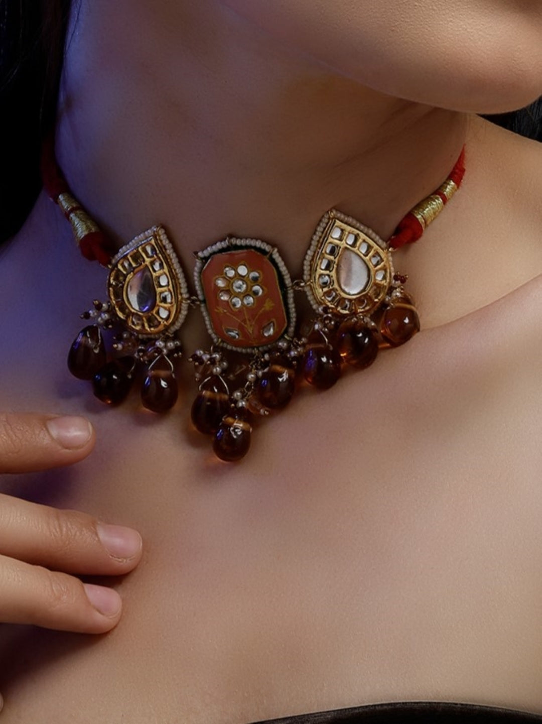 AIVY LUXE traditional Indian choker necklace with intricate stone and bead detailing on a red thread