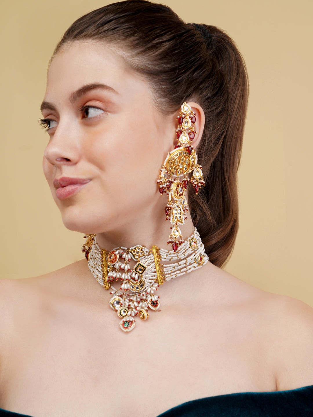 AIVY LUXE bridal kundan choker set worn by model featuring intricate gold and pearl design with matching earrings