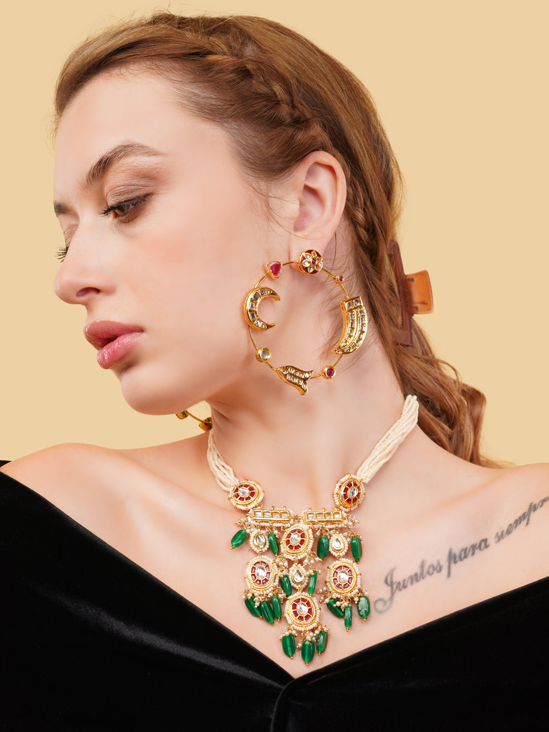 AIVY LUXE Chand Bala multicolour earrings worn by model with intricate gold and gemstone design