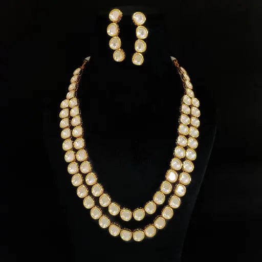 AIVY LUXE elegant gold plated Crimson Glow kundan necklace set with matching earrings on black display