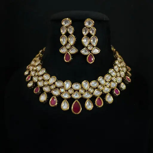 AIVY LUXE delicate bloom jewelry set featuring gold-tone necklace and earrings with white and red teardrop stones