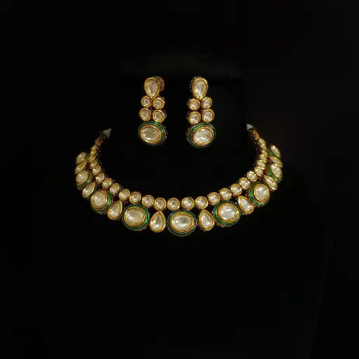 AIVY LUXE emerald kundan necklace set featuring traditional gold and green stone design with matching earrings
