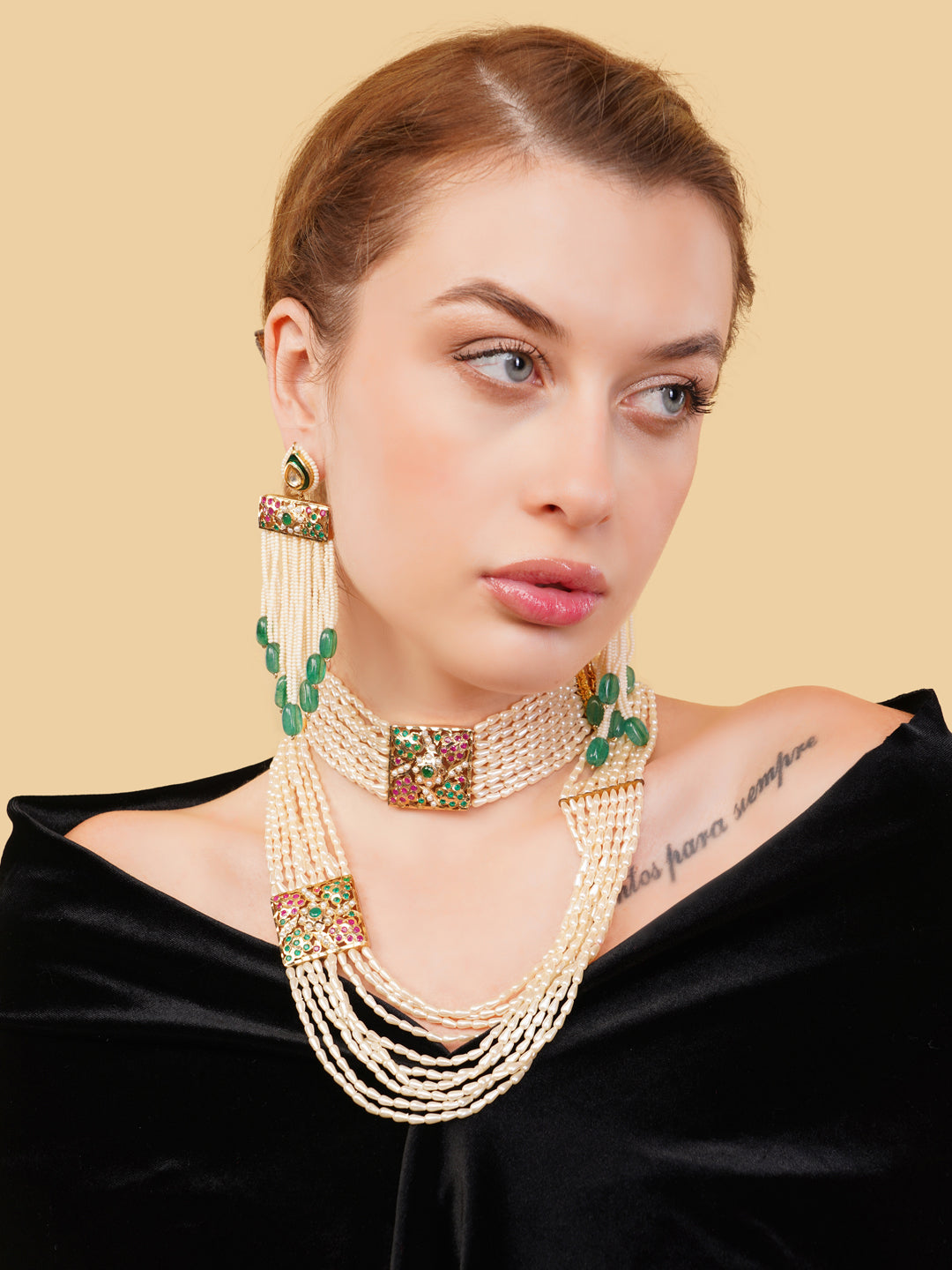 AIVY LUXE ethnic bridal drop earrings with green beads and intricate design worn by model