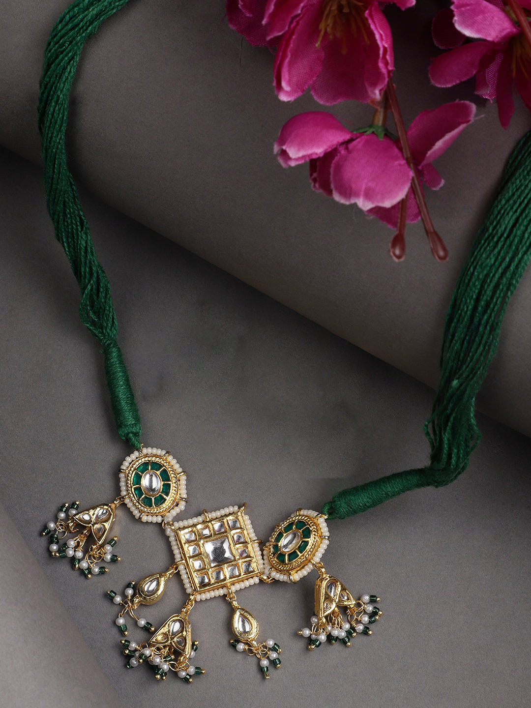 AIVY LUXE green kundan choker necklace with intricate gold and pearl detailing on green threads