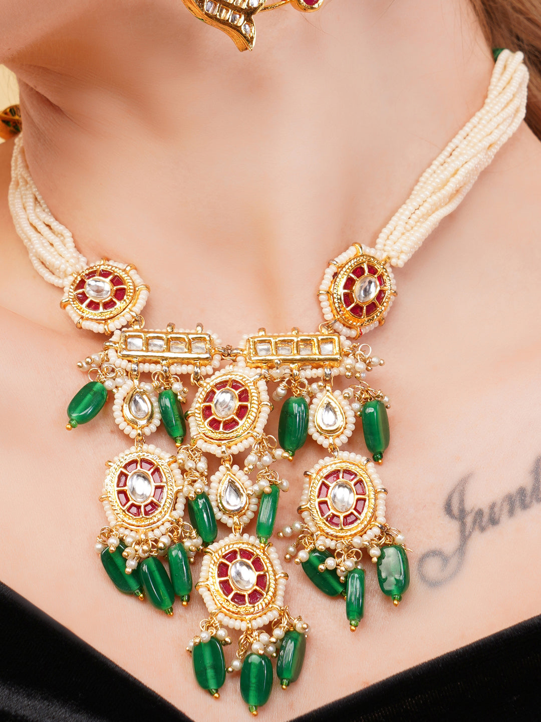 AIVY LUXE luxury ethnic gemstone necklace with red and green stones and intricate gold detailing