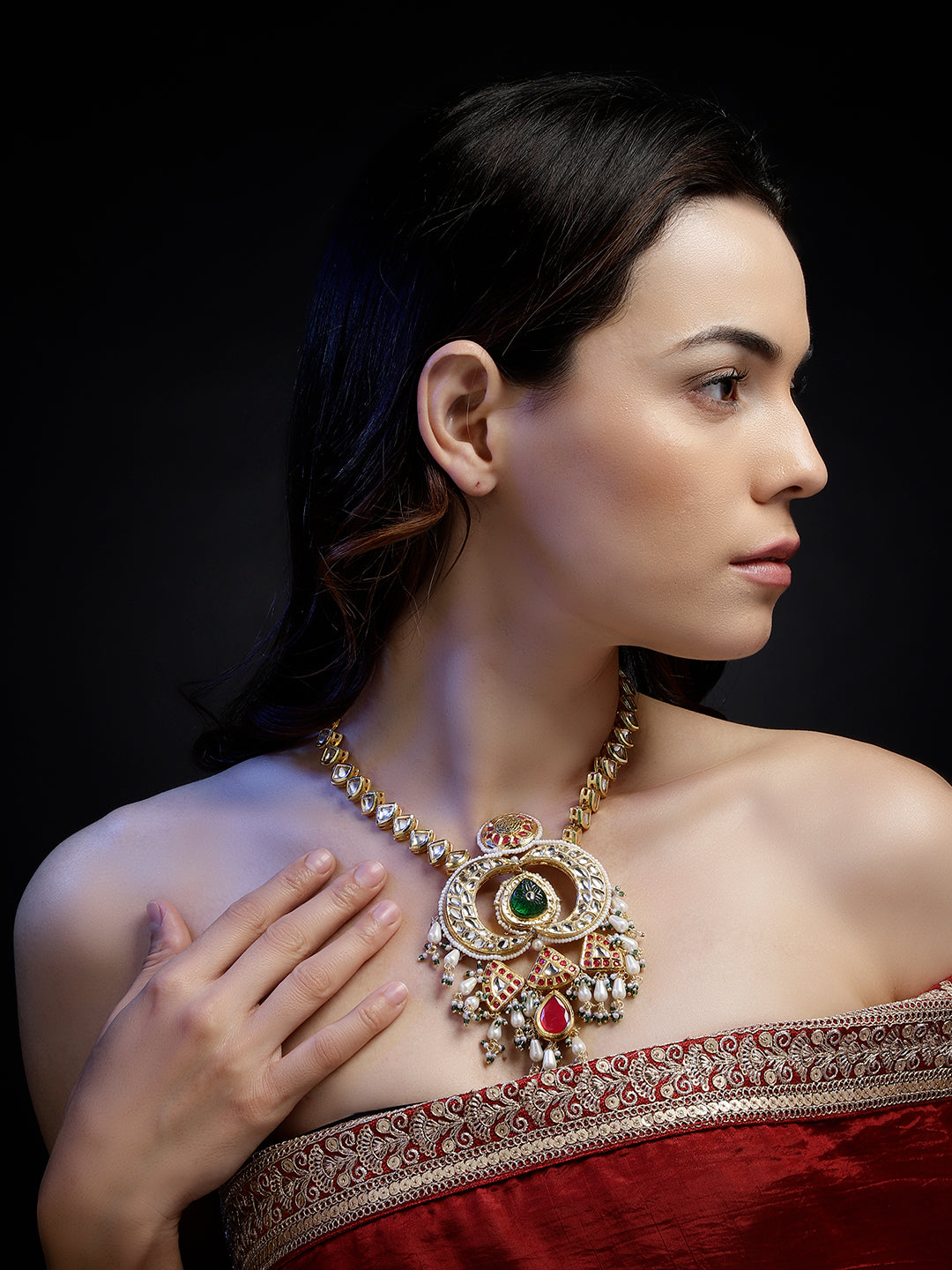 AIVY LUXE luxury ethnic necklace for weddings with intricate design worn by woman in red traditional attire