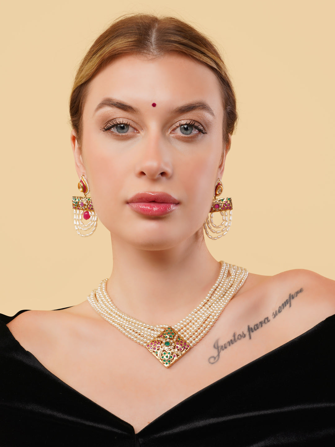 AIVY LUXE pearl embellished drop earrings worn by woman with matching pearl necklace and black off-shoulder top