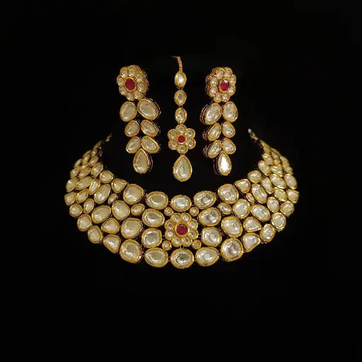 AIVY LUXE petite kundan necklace set with gold finish and red stone accents including earrings and maang tikka