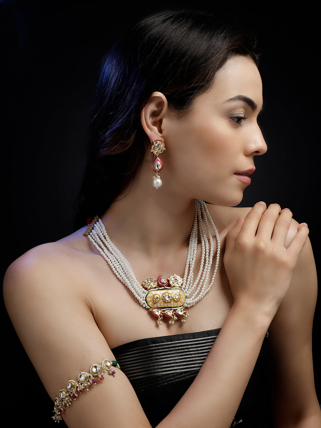 AIVY LUXE Rang-e-Gul artisan pearl earrings worn by woman with matching pearl necklace and armlet