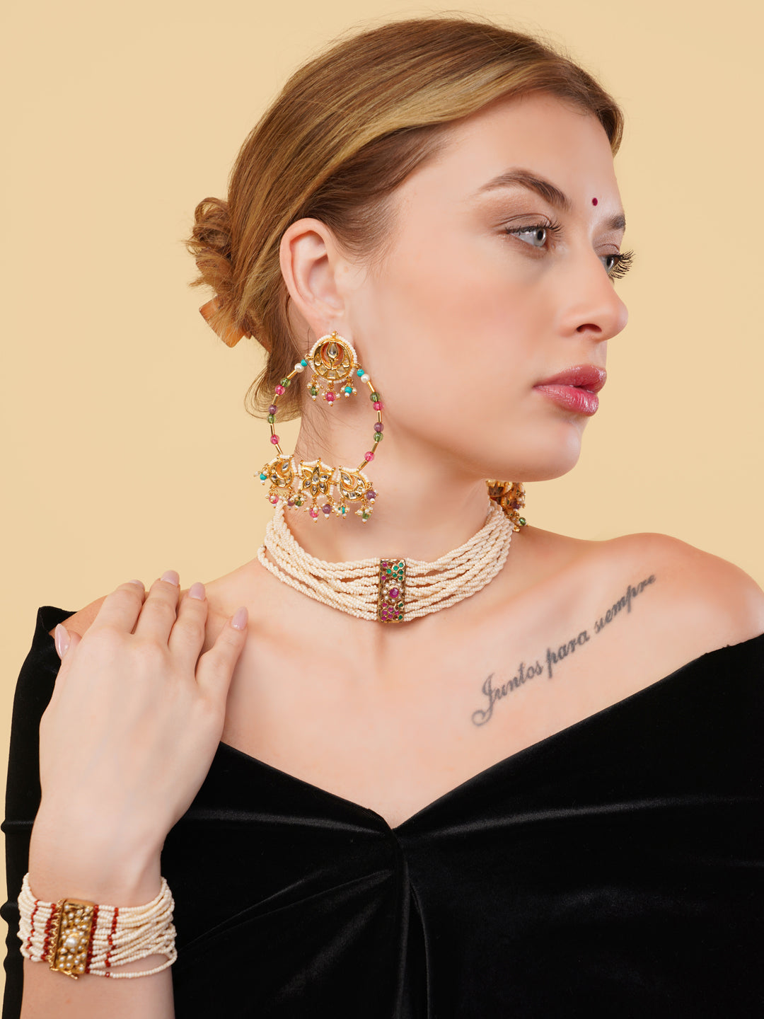 AIVY LUXE Rang-e-Gul designer earrings worn by model with matching pearl choker and bracelet
