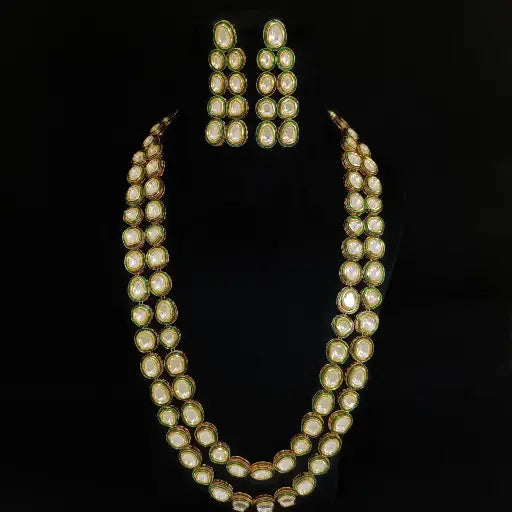 AIVY LUXE regal polki necklace set featuring double-layered necklace and matching earrings on black background