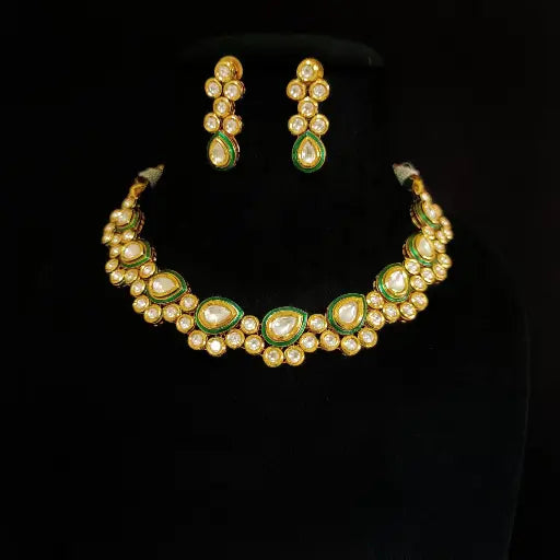 AIVY LUXE Ruby kundan necklace set featuring intricate gold design with green and white stones and matching earrings
