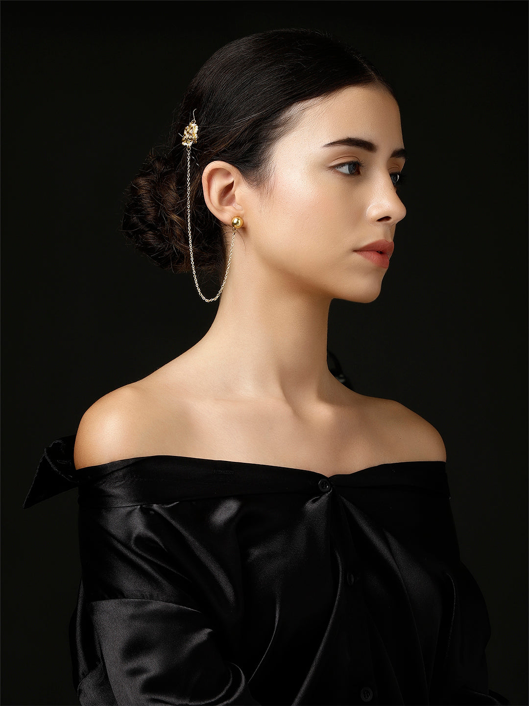 AIVY LUXE Shamsi Glow Drop Earring worn by woman with sleek black top and elegant hairstyle