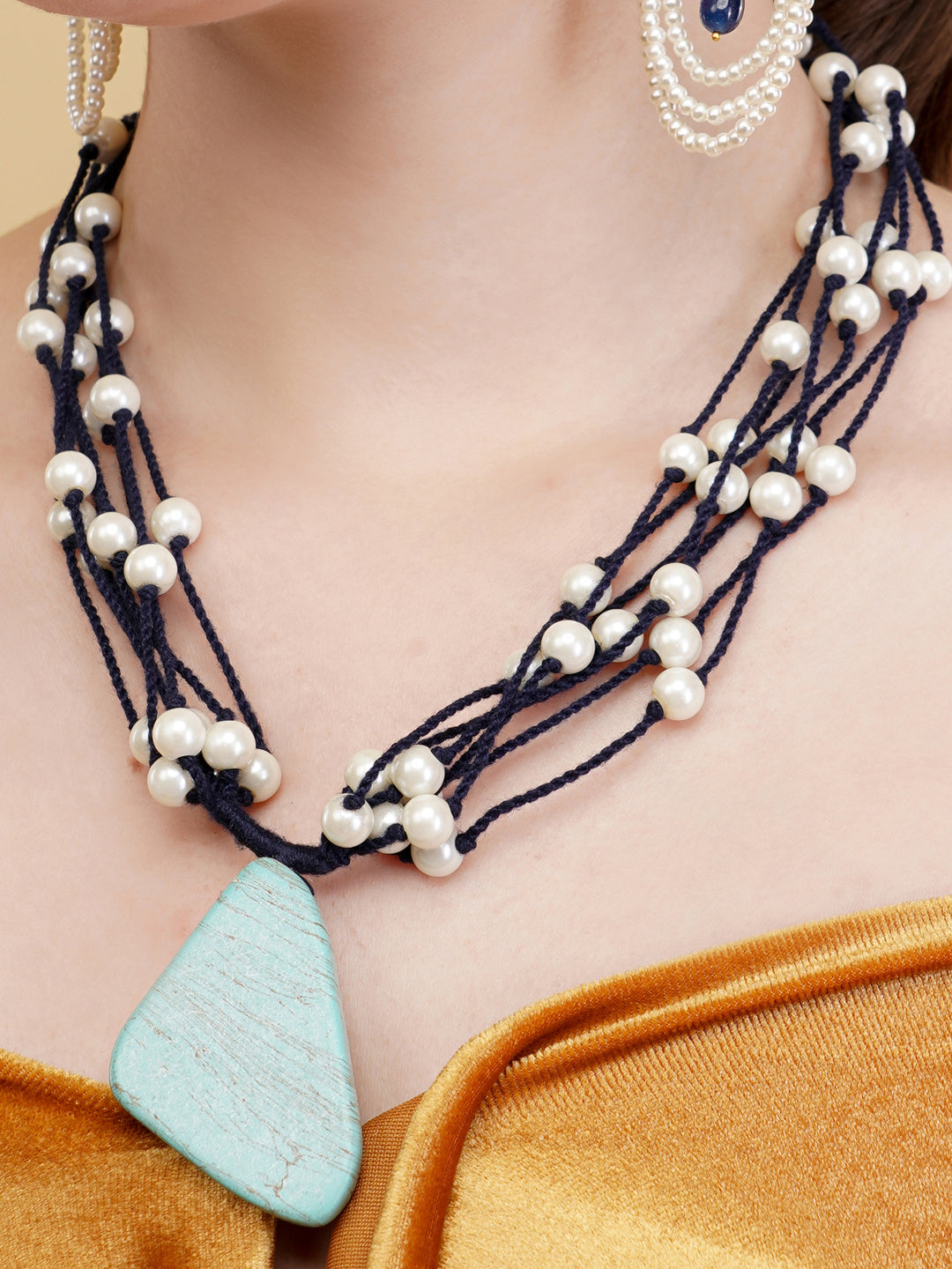 Aivy Luxe stunning blue stone haar necklace with multi-strand black cords and white pearls
