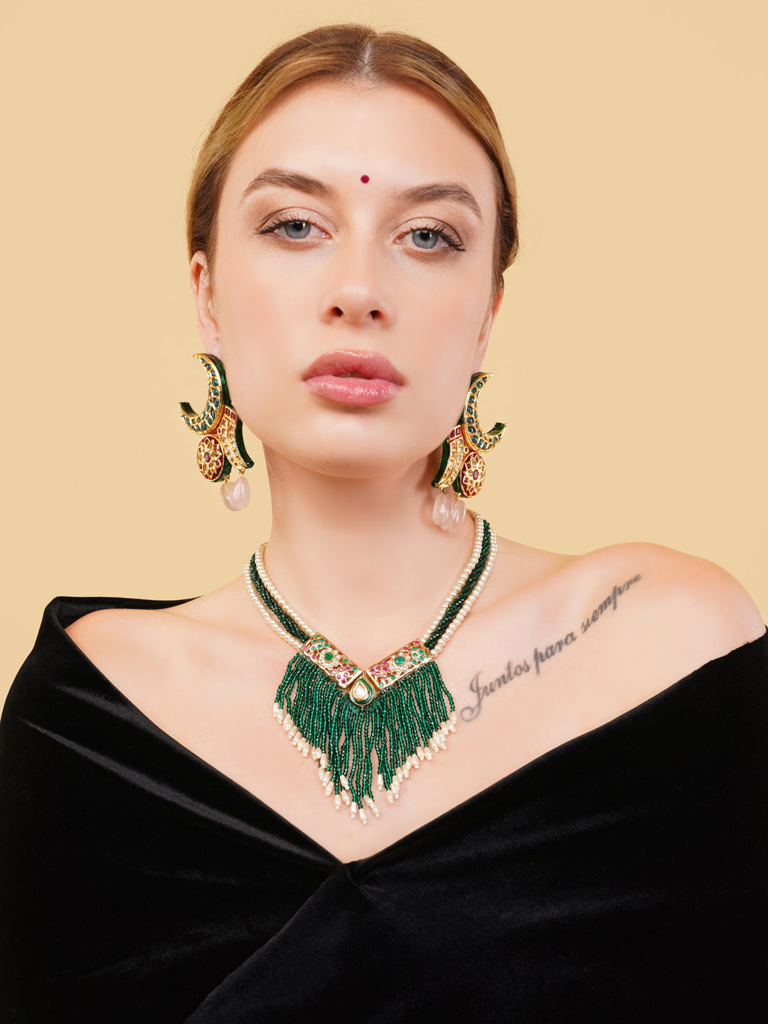 AIVY LUXE emerald pearl stone Indian drop earrings worn by woman with matching green necklace