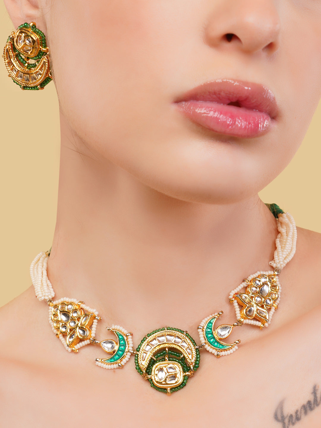 AIVY LUXE green gold statement jewelry set featuring intricate necklace and matching earrings
