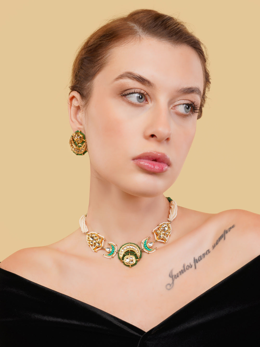 AIVY LUXE green gold statement jewelry set with necklace and earrings worn by model