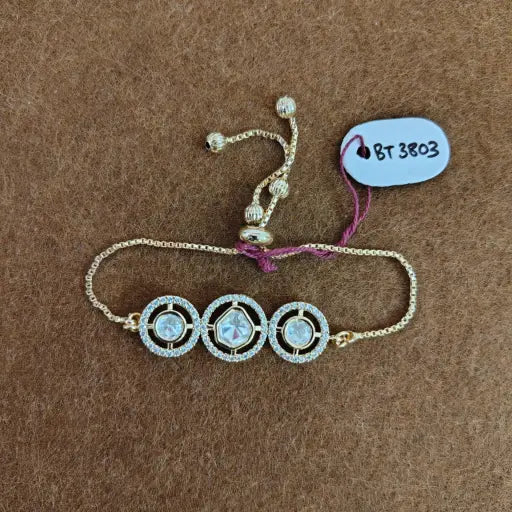 AIVY LUXE women's gold adjustable bracelet with three circular crystal charms on a gold chain