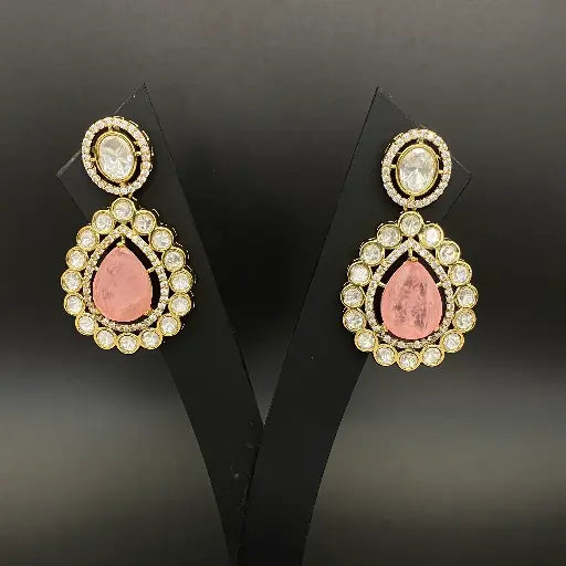 Side view of bridal gold-toned jhumkas