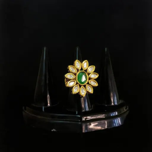 Radiant kundan flower ring with oval petals in a golden setting