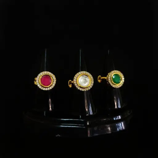 Minimalist trio of kundan rings in red, white, and green stones