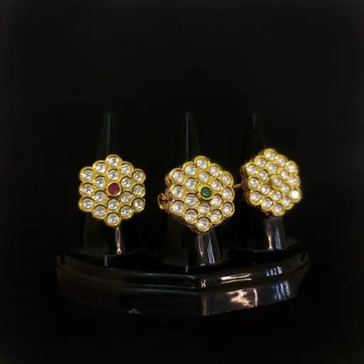Hexagonal kundan rings with intricate golden detailing