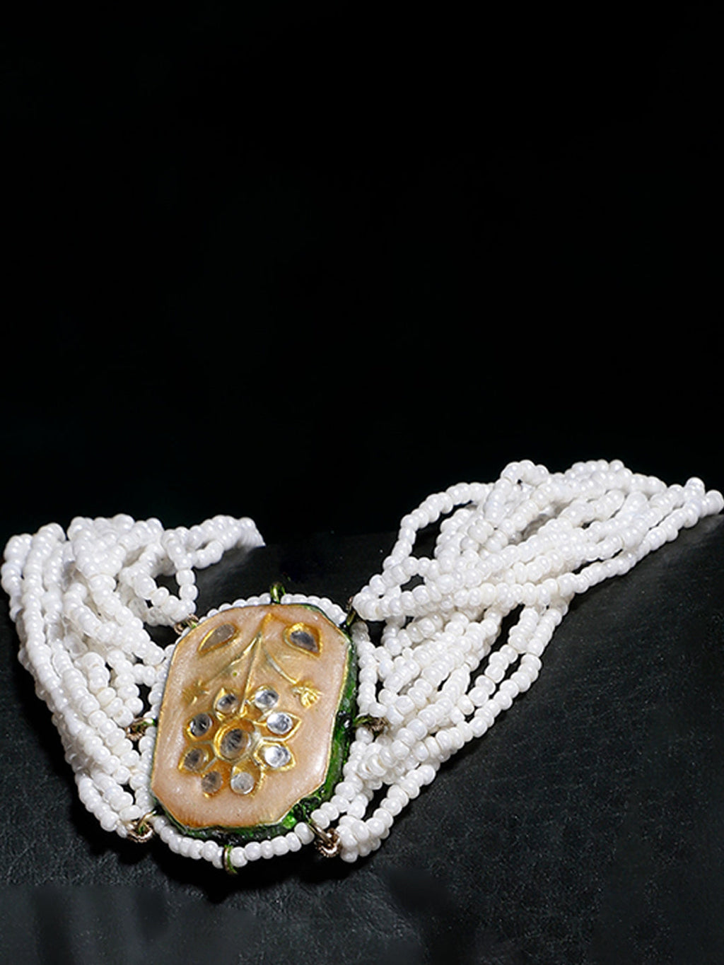 AIVY LUXE artisanal beaded jewelry for women featuring white multi-strand bracelet with ornate central stone