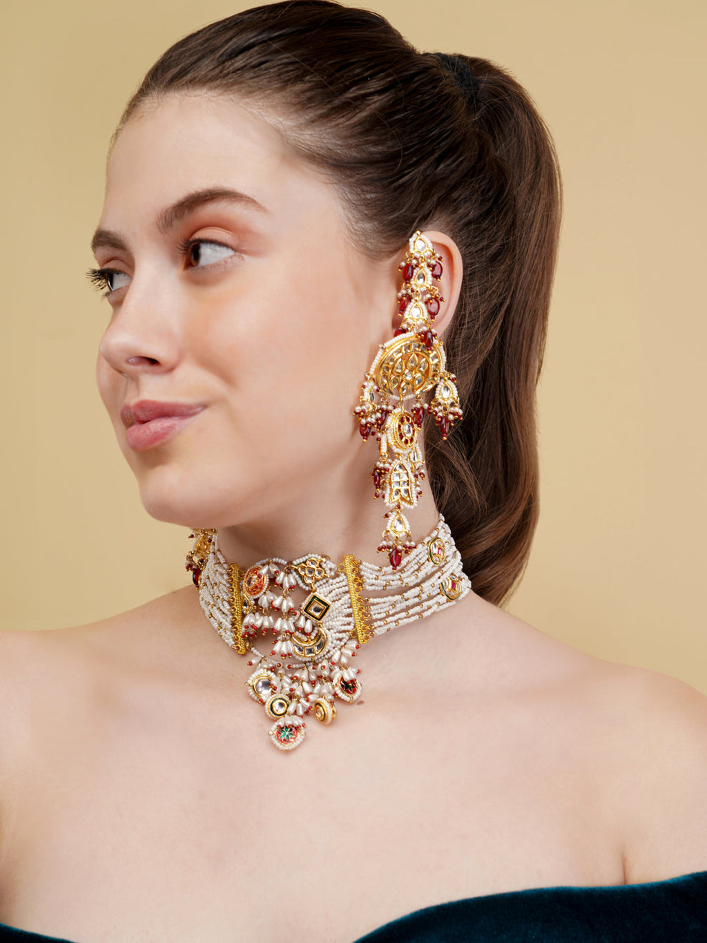AIVY LUXE bridal kundan choker set worn by model featuring intricate gold and pearl design with matching earrings