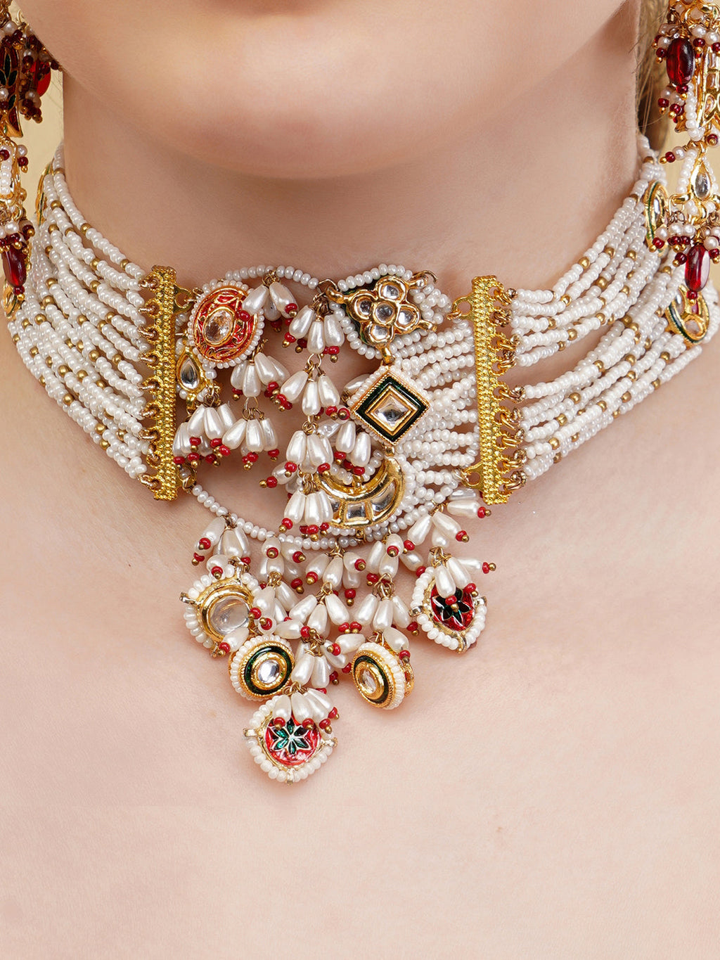 AIVY LUXE bridal kundan choker set with white beads and intricate gold and red detailing