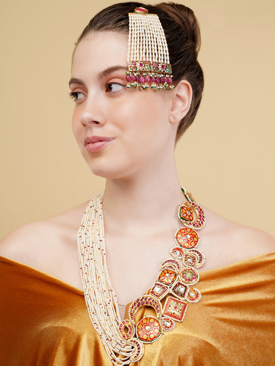 AIVY LUXE bridal zarqaani haar necklace featuring intricate beadwork and orange floral designs worn by a woman