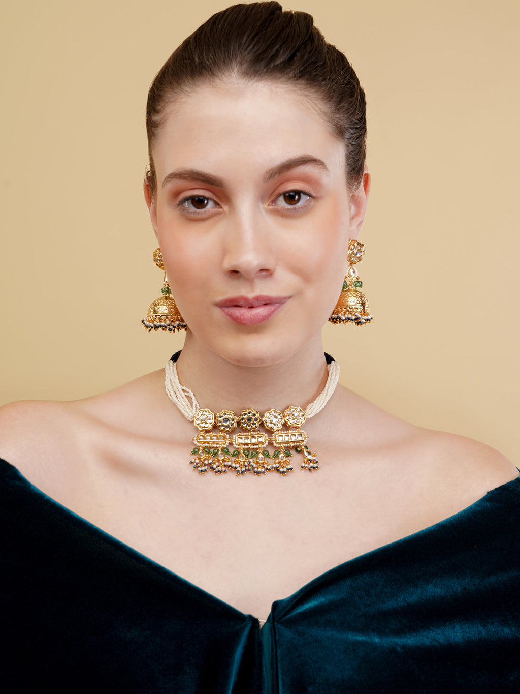 AIVY LUXE designer ethnic necklace for women with gold floral and bead detailing worn with matching earrings
