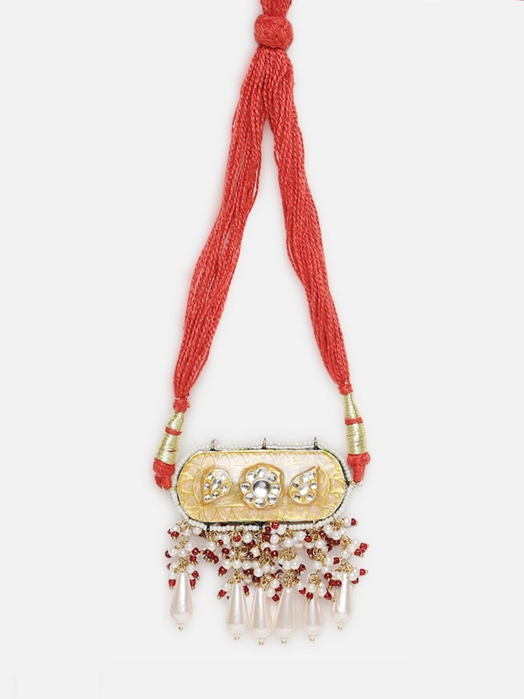 AIVY LUXE elegant bajubandh with red threads and ornate golden pendant showcasing contemporary Indian arm jewelry