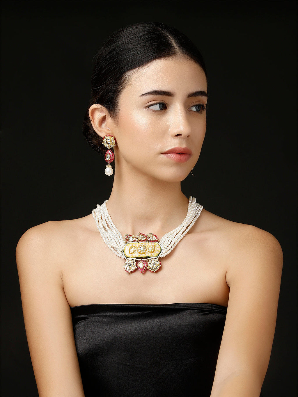 AIVY LUXE designer Indian fusion necklace with pearl strands and gold accents worn by woman in black strapless top