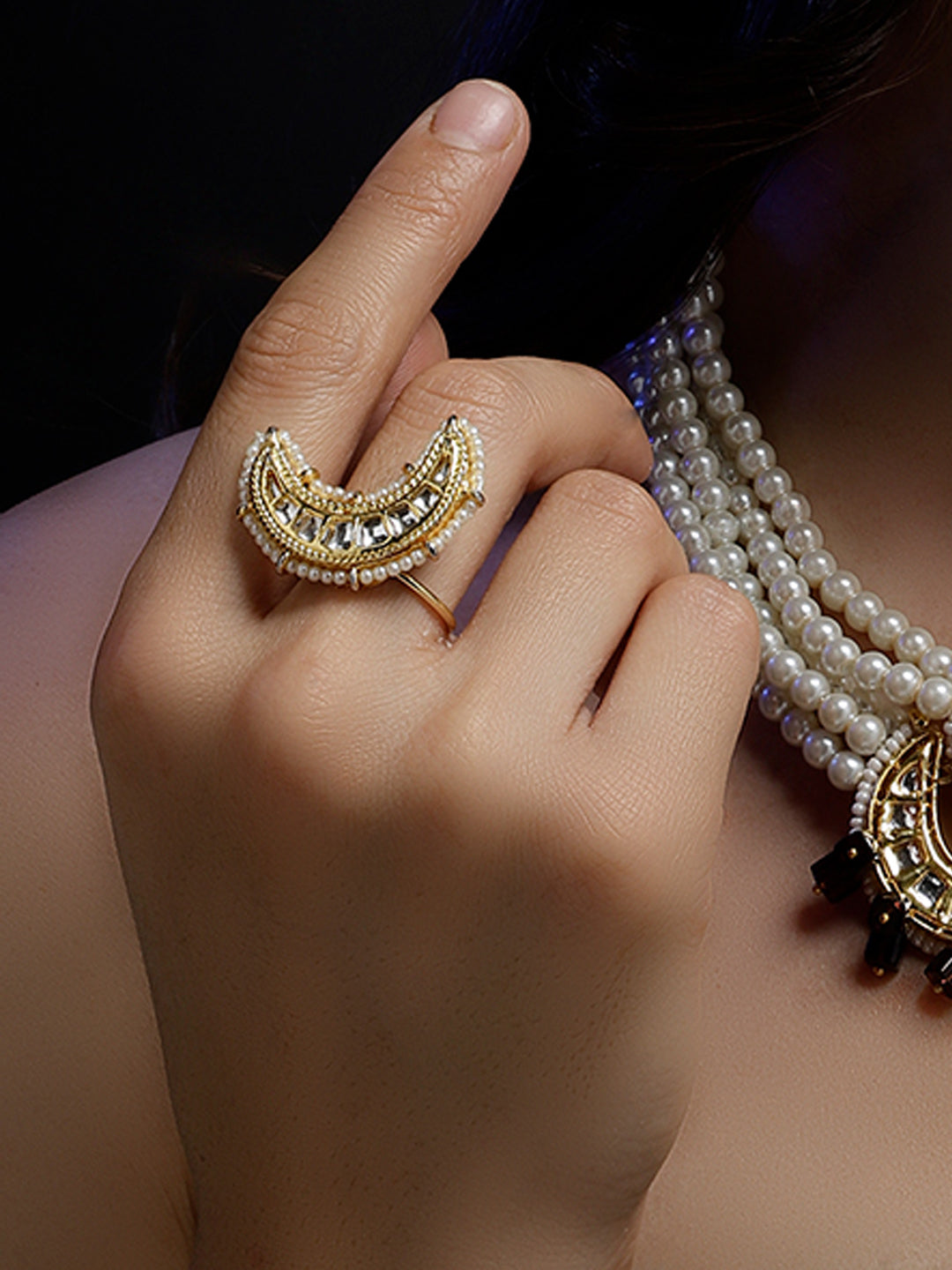 AIVY LUXE elegant gold statement ring with pearls and intricate design worn on finger