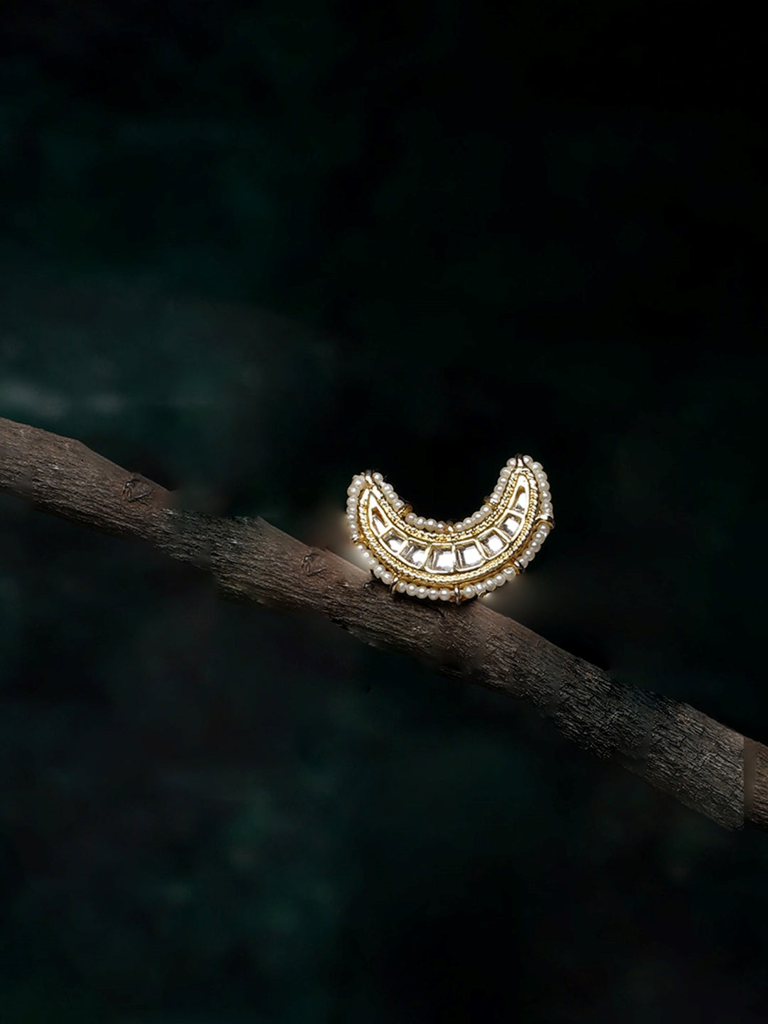 AIVY LUXE designer statement ring for women with intricate gold and white detailing on a dark background