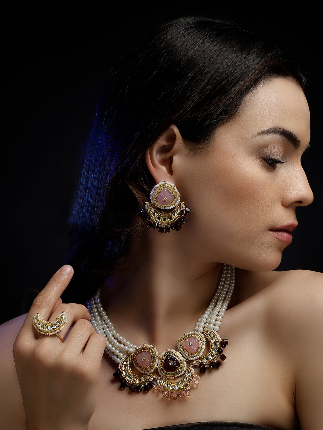 AIVY LUXE designer statement ring for women worn on hand with matching statement earrings and pearl necklace