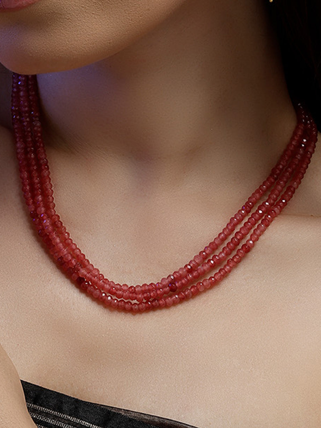 AIVY LUXE elegant multi strand necklace for women featuring red beads draped on the neck