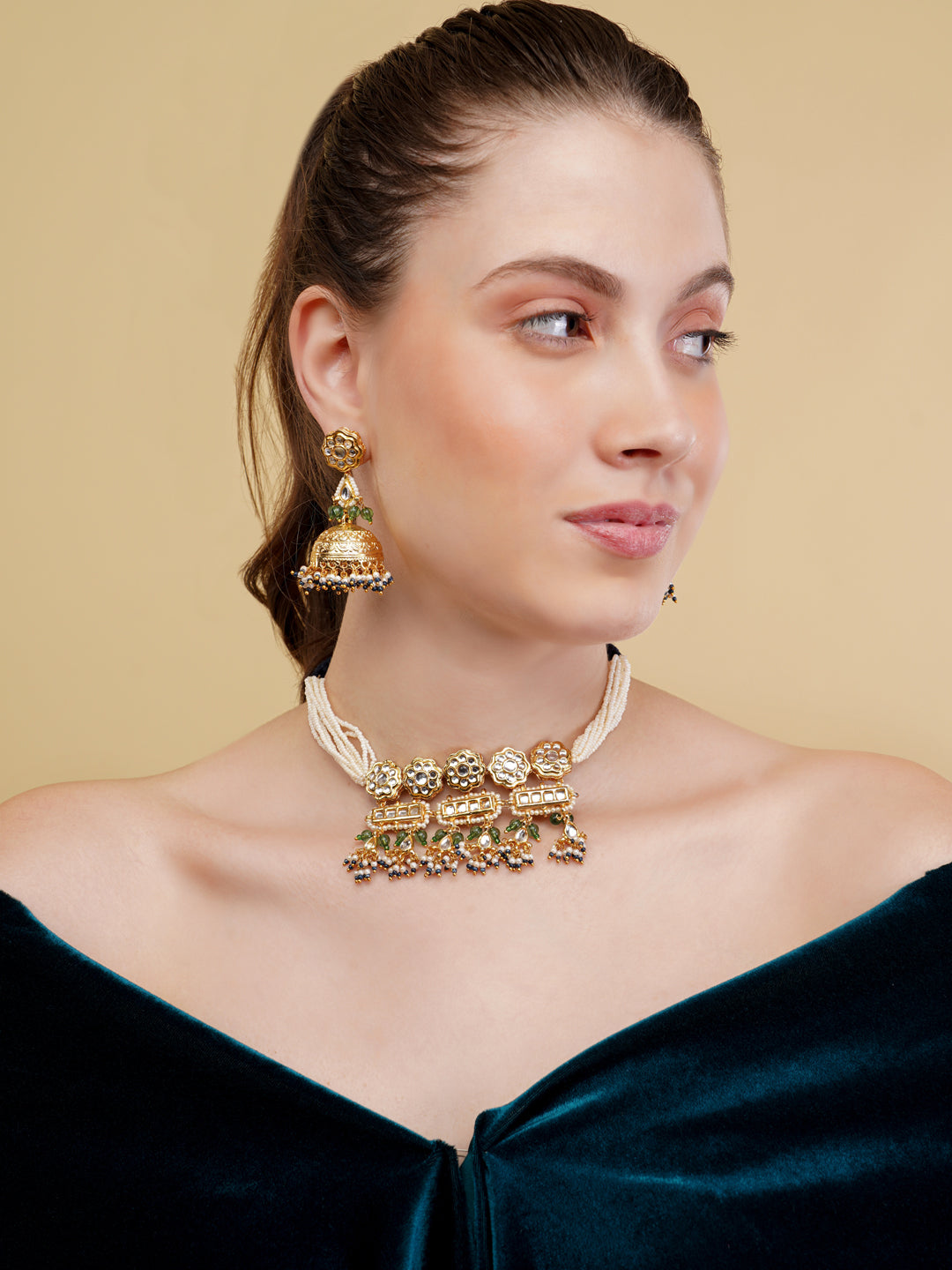 AIVY LUXE Ethnic Haar with Earrings featuring gold-tone designs and pearl accents on a model