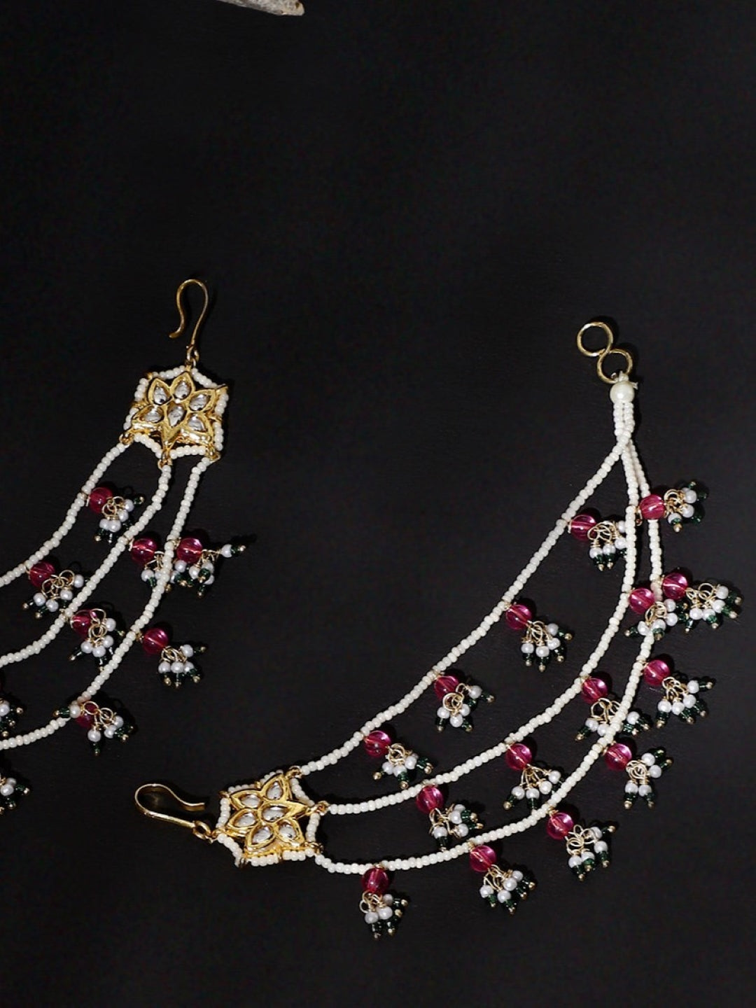 AIVY LUXE ethnic statement ear chains with intricate white beads and red accents on gold hooks