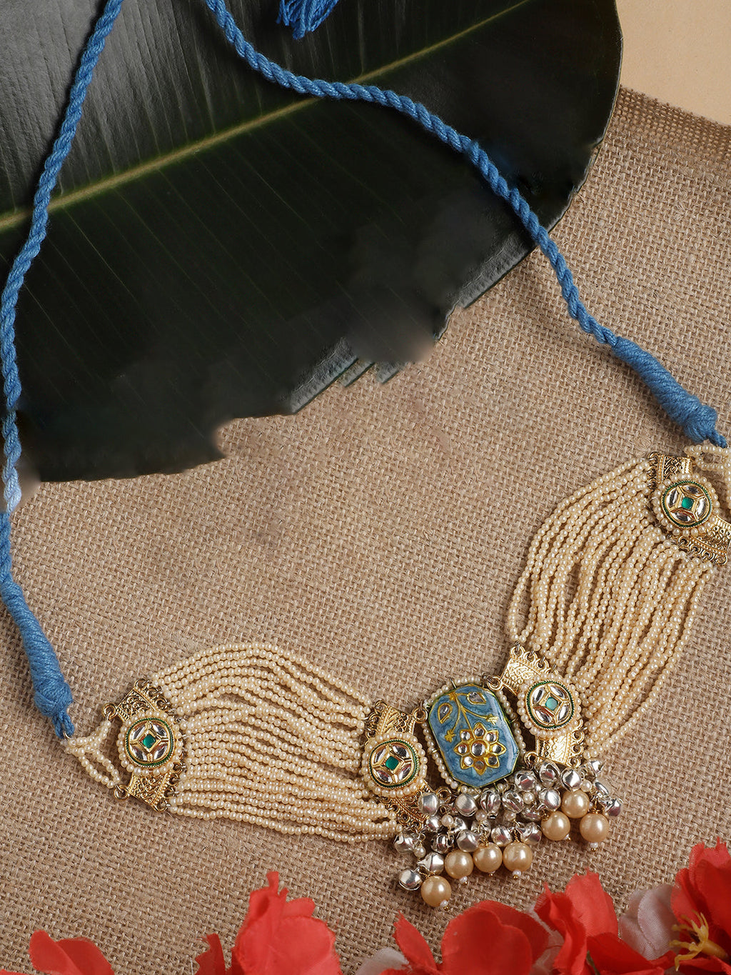 AIVY LUXE firoza choker necklace with intricate beadwork and blue cord on a burlap background