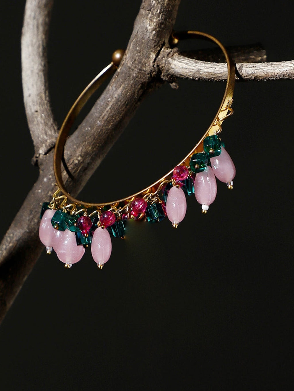 AIVY LUXE handcrafted bracelet for women with gold band and pink and green gemstone charms