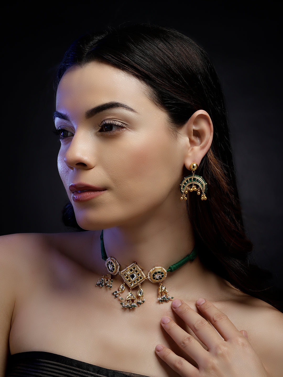 AIVY LUXE handcrafted statement earrings worn by a woman with matching necklace and dark background