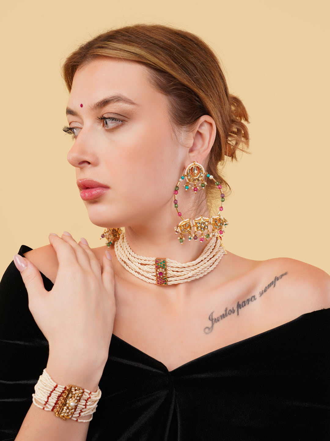 AIVY LUXE handmade pearl bracelet for women worn with matching pearl necklace and colorful earrings