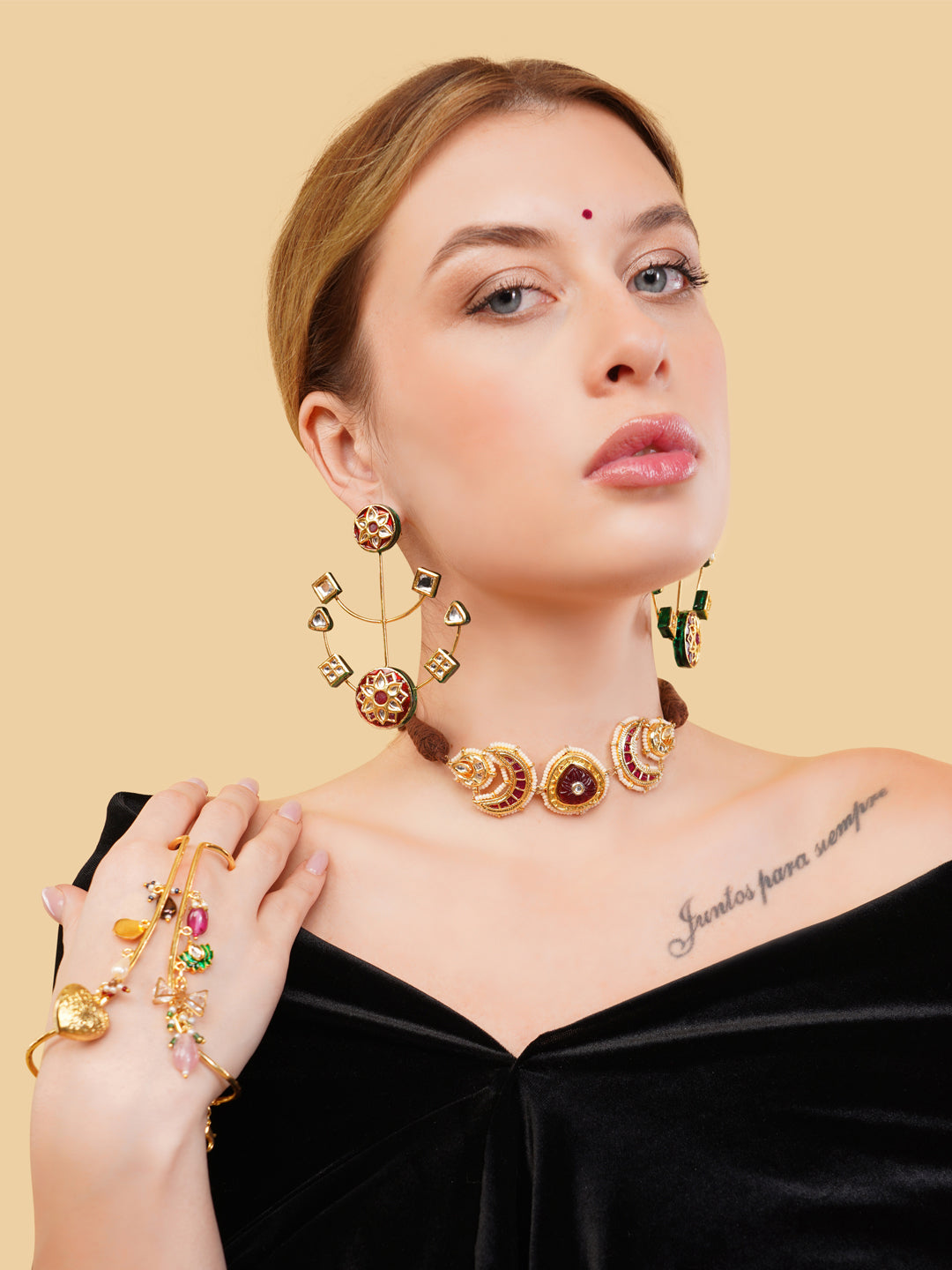 AIVY LUXE heritage style drop earrings worn by a model paired with matching jewelry and black off-shoulder outfit