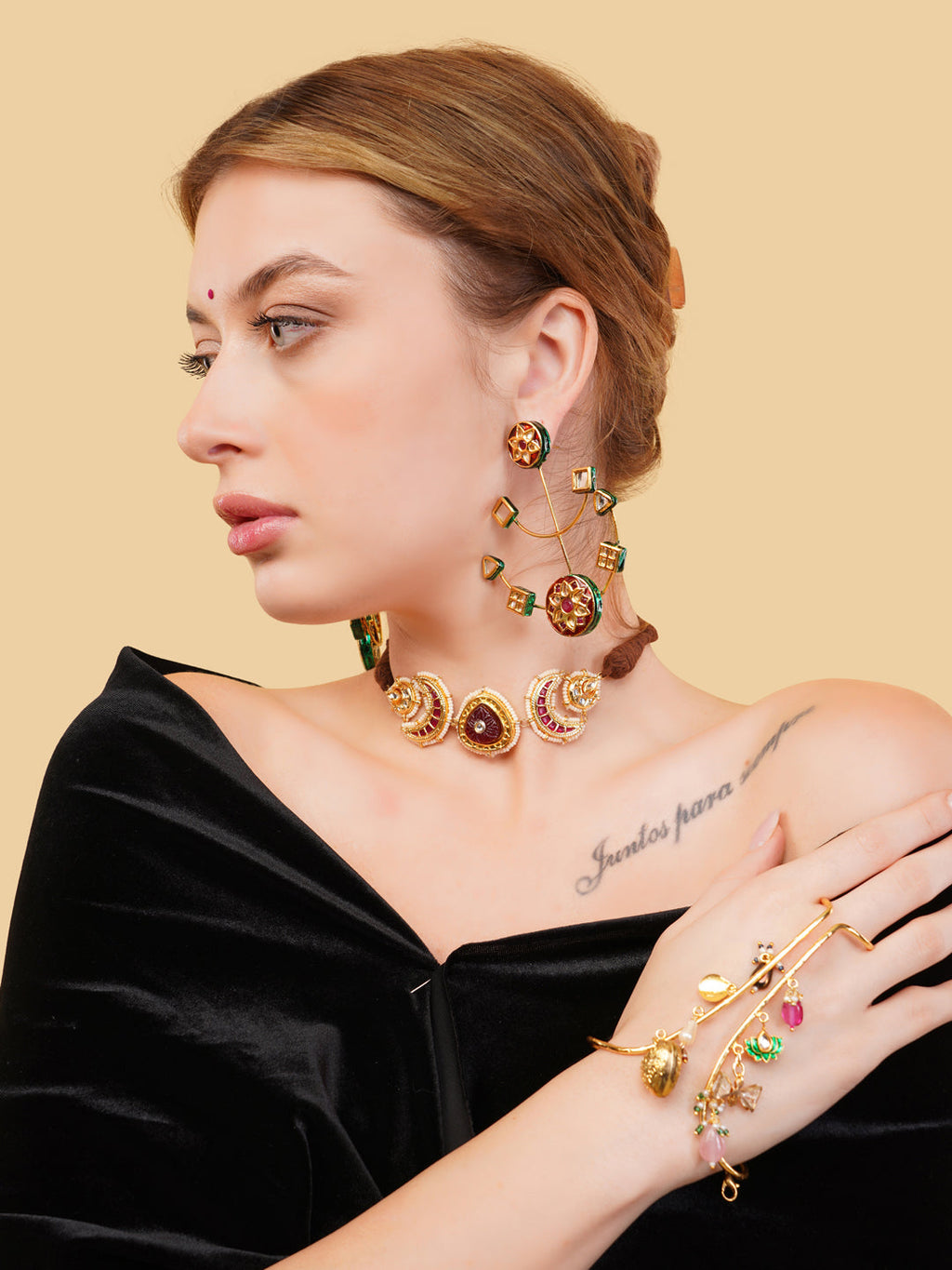 AIVY LUXE heritage style drop earrings worn by woman with matching choker and bracelet in gold and red accents