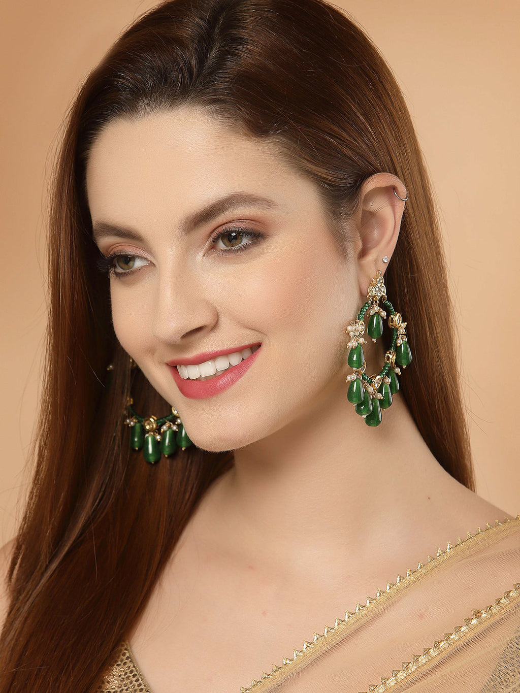 AIVY LUXE green and gold hunter chand bala earring online worn by smiling woman