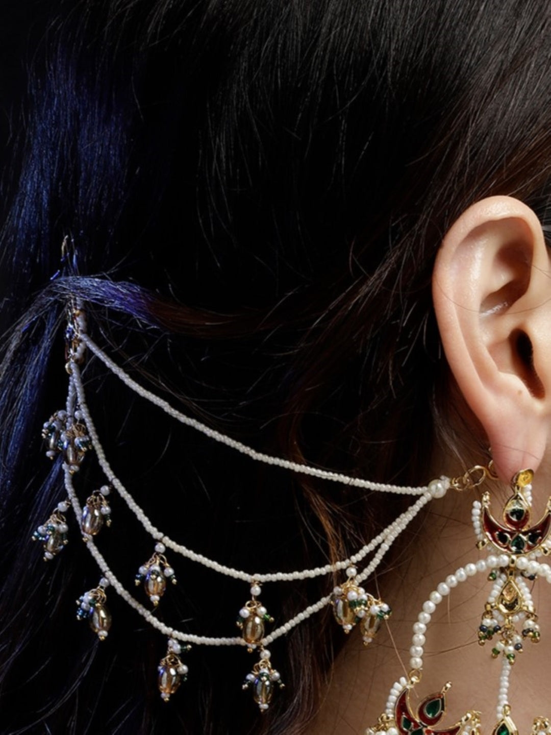 Husn-e-Arq Kanchain earrings by AIVY LUXE featuring intricate pearl and gold bead design on ear